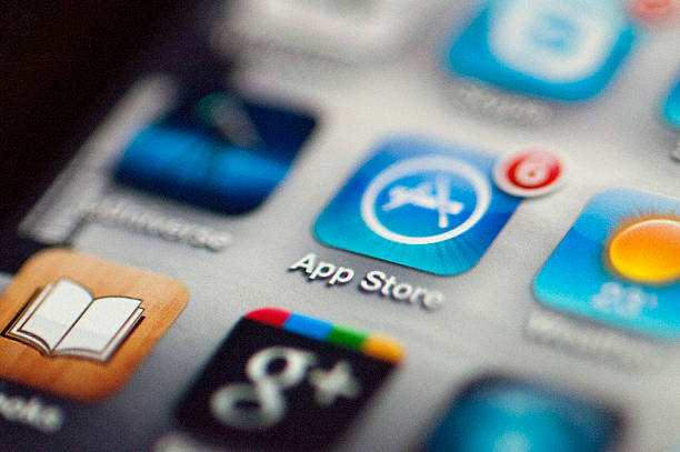 App Store icon on an iphone "Cape Town, South Africa - August 23, 2011: App Store icon on an iphone 4, manufactured by Apple" Features and Functionality in app stock pictures, royalty-free photos & images